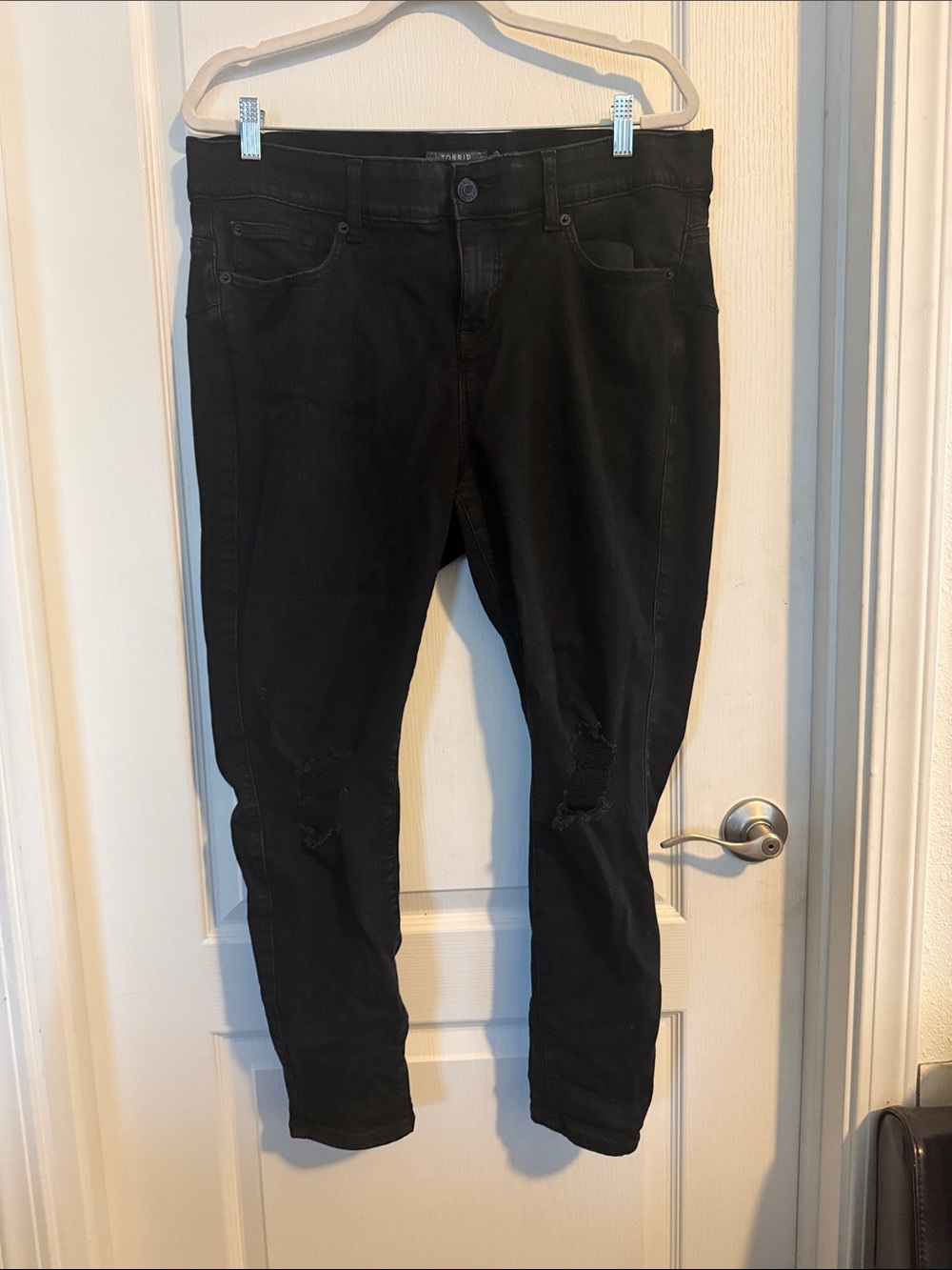 Torrid Black Distressed Skinny Jeans with Knee Rip